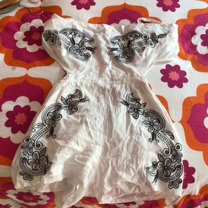 Tie in the back strapless romper